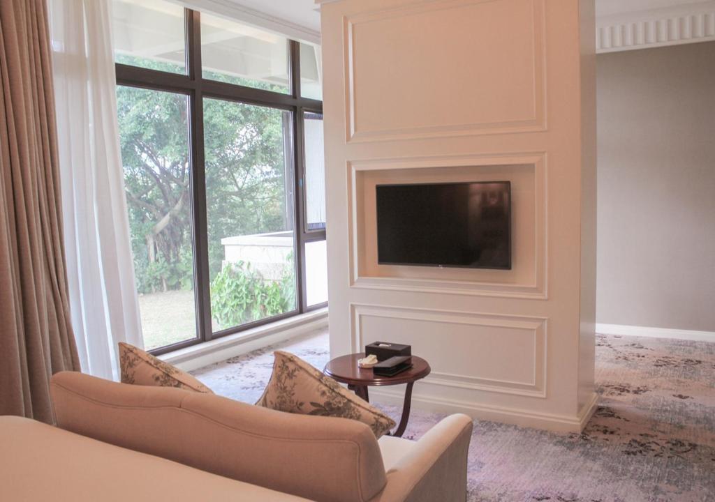 TV a/nebo společenská místnost v ubytování Carp Islet Resort Fuzhou