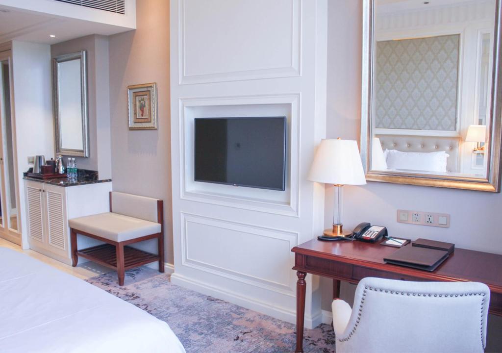 Postel nebo postele na pokoji v ubytování Carp Islet Resort Fuzhou