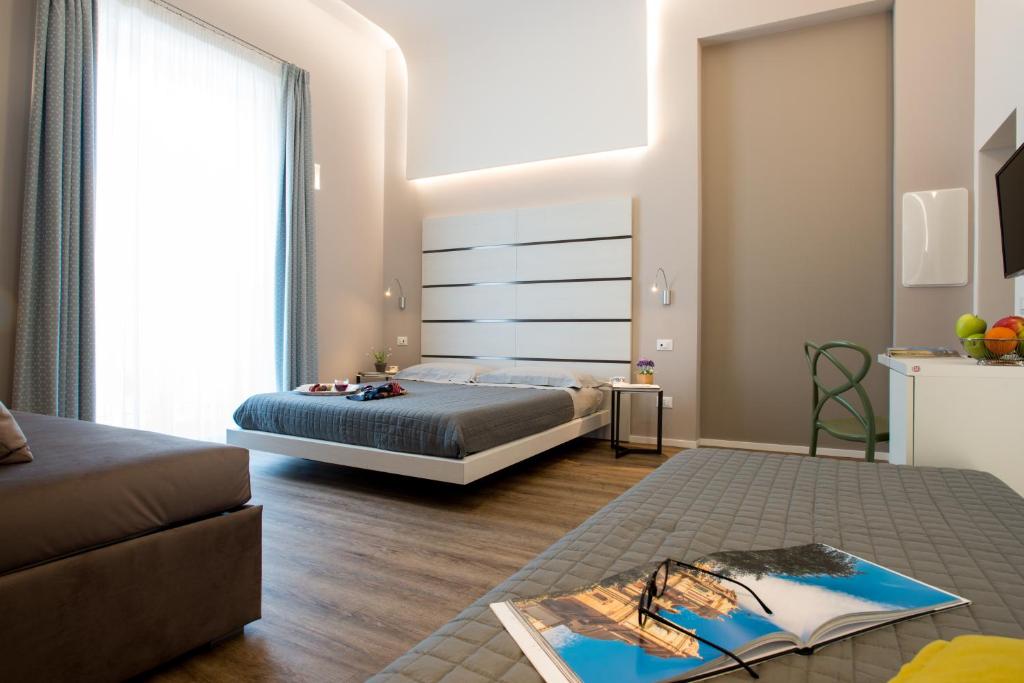 A bed or beds in a room at B&B In Centro Palermo