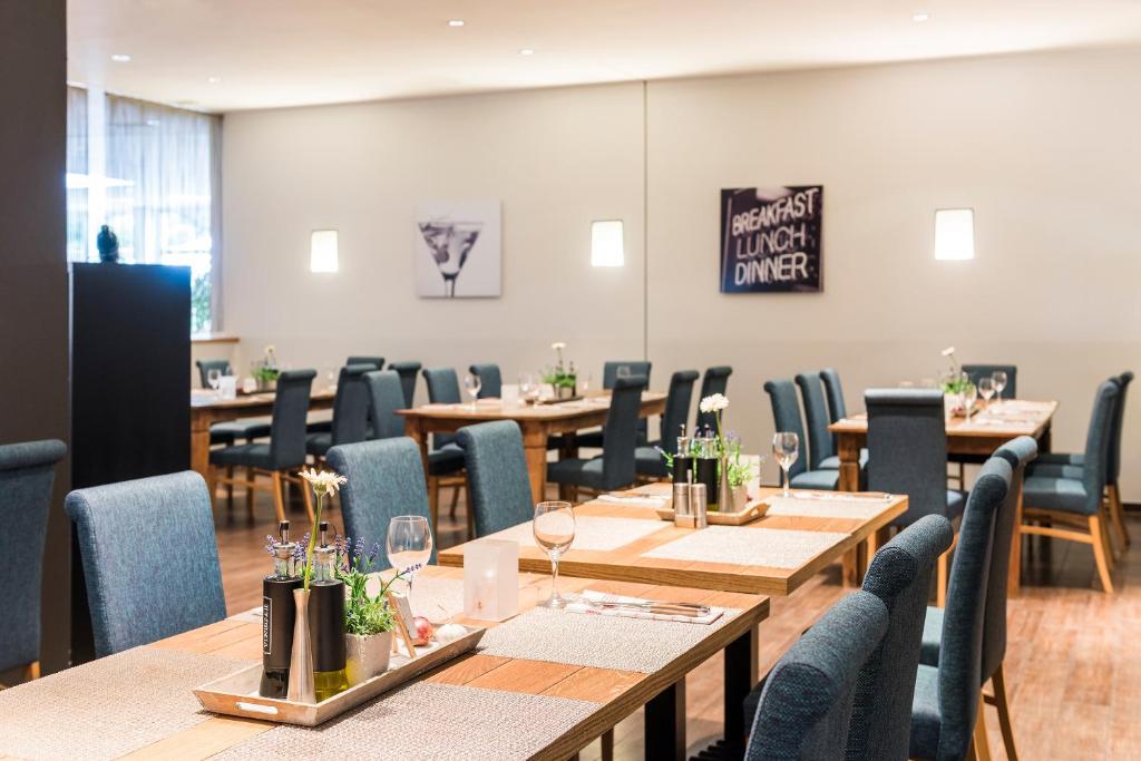 Hotel Oberhausen Neue Mitte affiliated by Meliáにあるレストランまたは飲食店