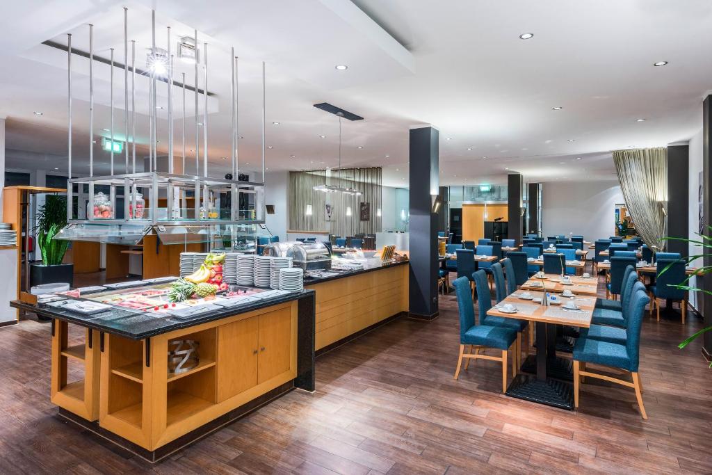 Hotel Oberhausen Neue Mitte affiliated by Meliáにあるレストランまたは飲食店