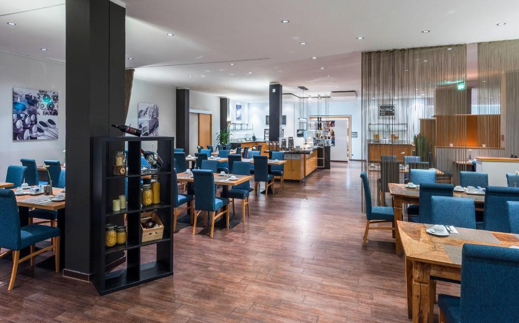 Hotel Oberhausen Neue Mitte affiliated by Meliáにあるレストランまたは飲食店