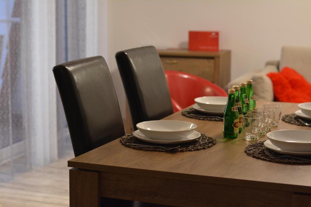 Posedenie v ubytovaní Apartament przy Latarni Morskiej