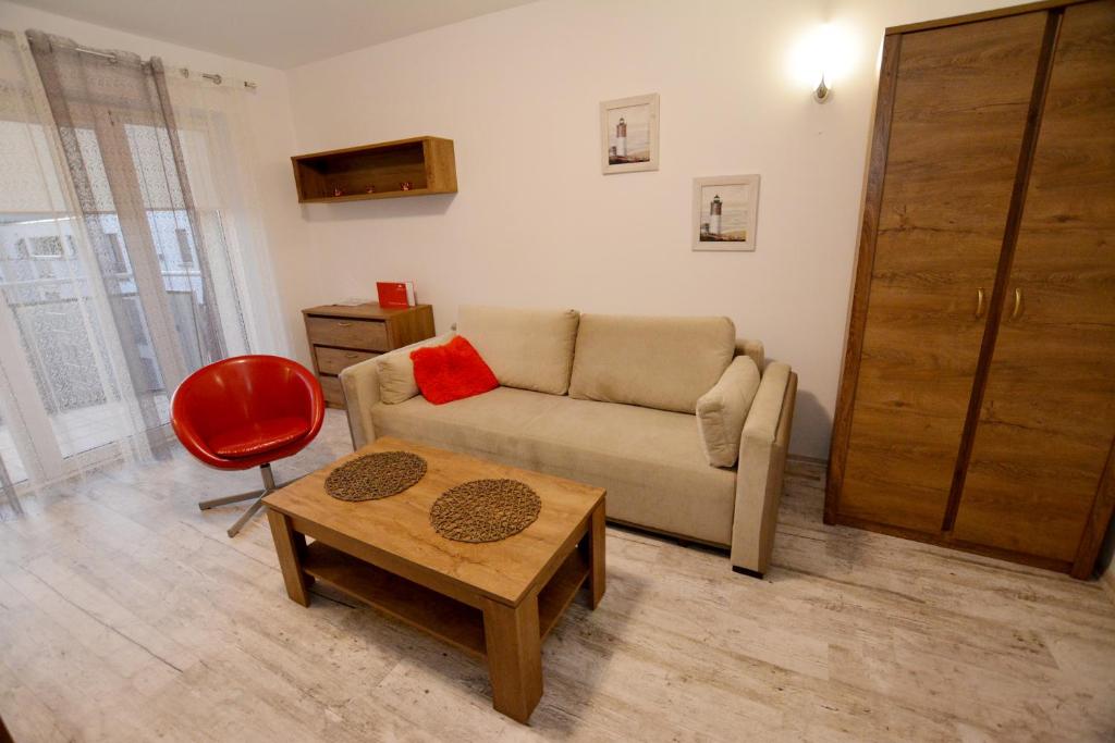 Posedenie v ubytovaní Apartament przy Latarni Morskiej