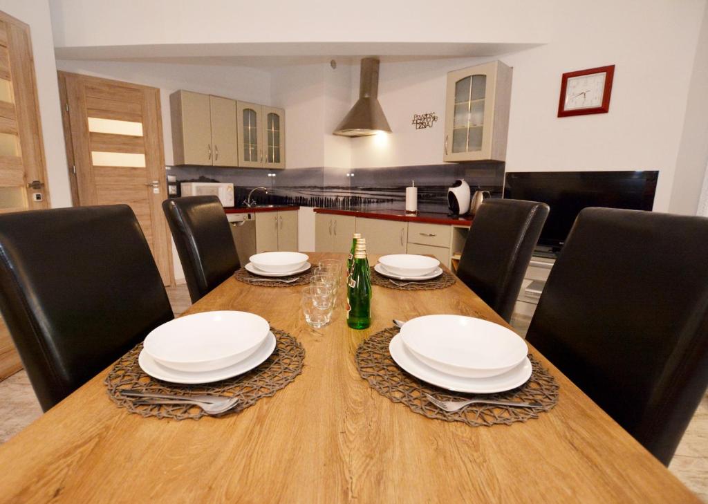 Posedenie v ubytovaní Apartament przy Latarni Morskiej