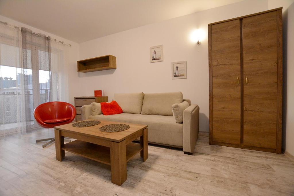 Posedenie v ubytovaní Apartament przy Latarni Morskiej