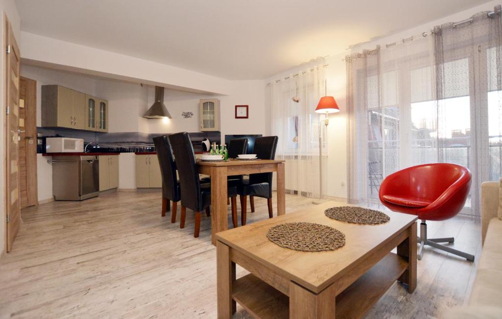 Posedenie v ubytovaní Apartament przy Latarni Morskiej