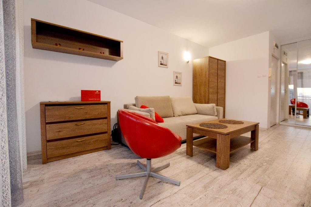 Posedenie v ubytovaní Apartament przy Latarni Morskiej