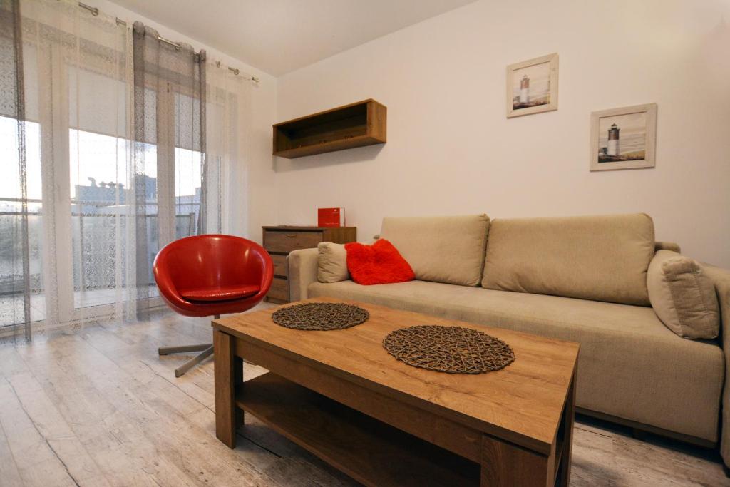 Posedenie v ubytovaní Apartament przy Latarni Morskiej