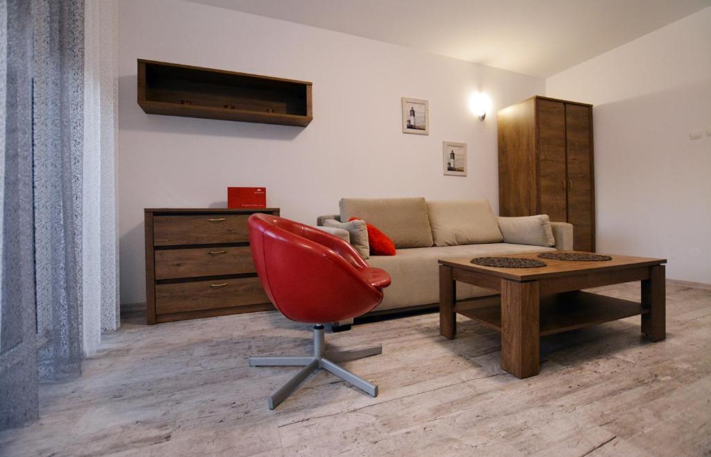 Posedenie v ubytovaní Apartament przy Latarni Morskiej