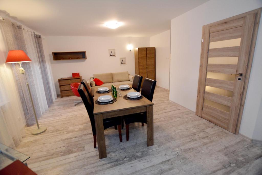 Posedenie v ubytovaní Apartament przy Latarni Morskiej