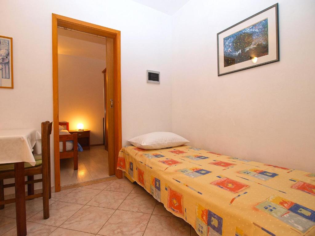 Łóżko lub łóżka w pokoju w obiekcie Apartment Elda 1455