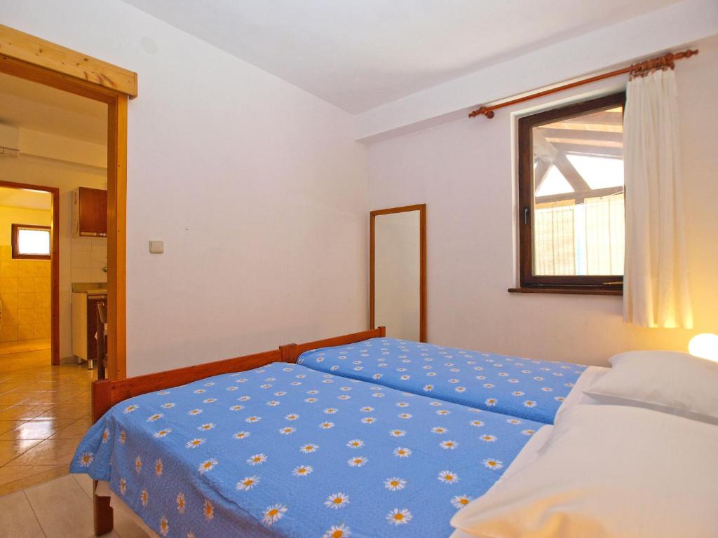Łóżko lub łóżka w pokoju w obiekcie Apartment Elda 1455