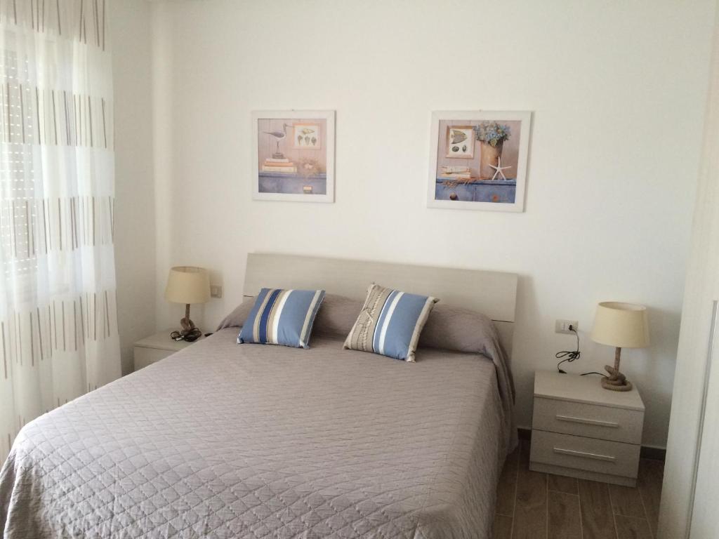 Postel nebo postele na pokoji v ubytování B&B LINEABLU