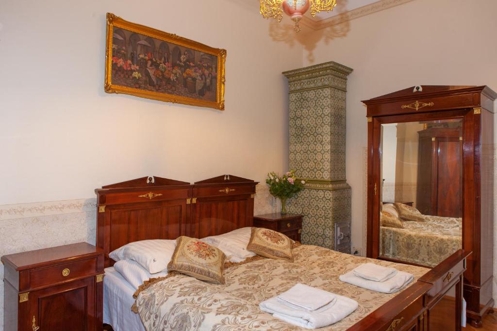 Posteľ alebo postele v izbe v ubytovaní Metropolitan Apartments