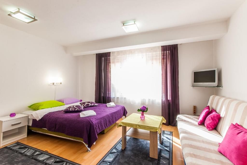Cama o camas de una habitación en Apartments Kira