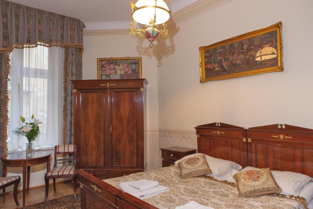 Posteľ alebo postele v izbe v ubytovaní Metropolitan Apartments