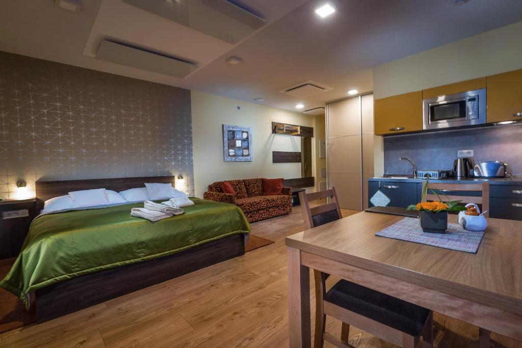 Postel nebo postele na pokoji v ubytování Apartmánový Dom Kriváň