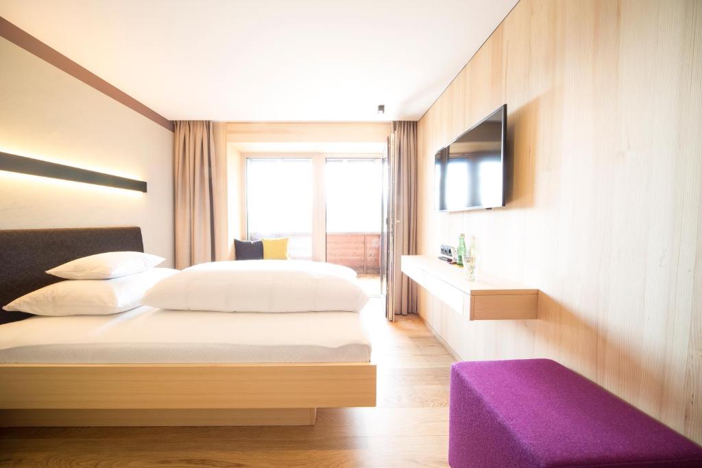 Postel nebo postele na pokoji v ubytování Landhaus Maria Grün B&B