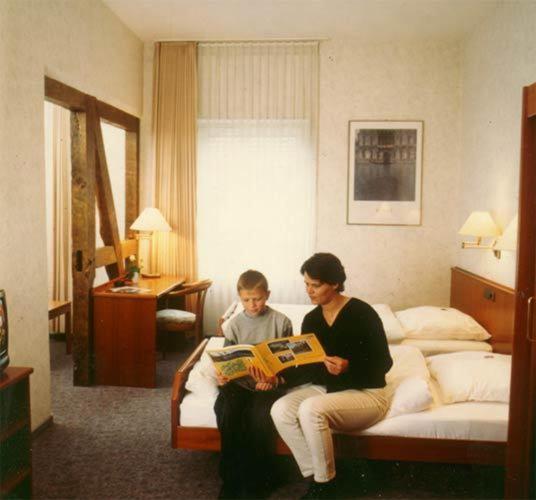Postel nebo postele na pokoji v ubytování Ackfeld Hotel-Restaurant