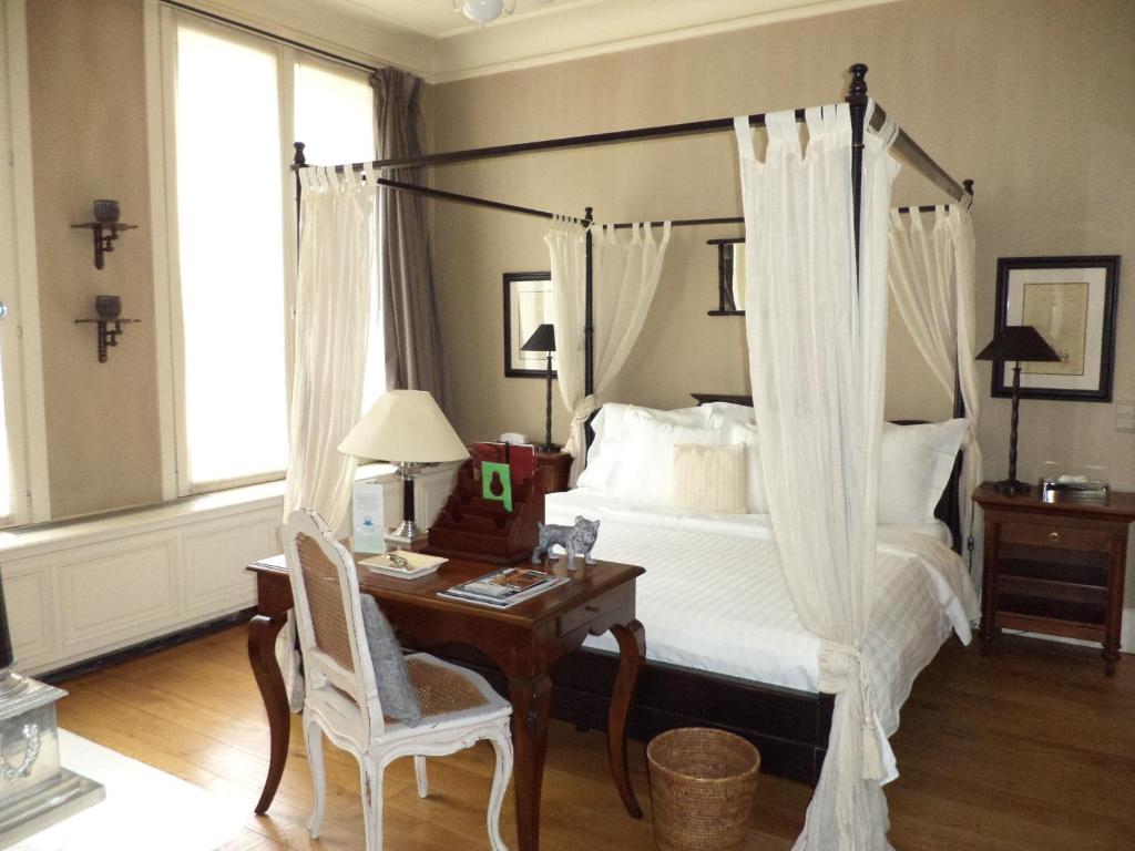 Postel nebo postele na pokoji v ubytování Hotel Recour