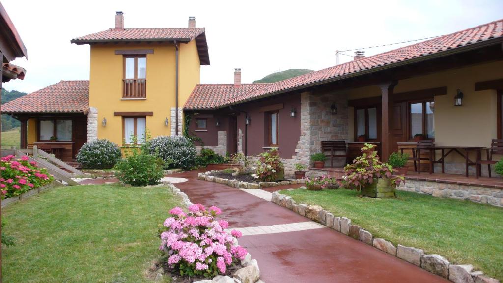 Zahrada ubytování Apartamentos La Calvera