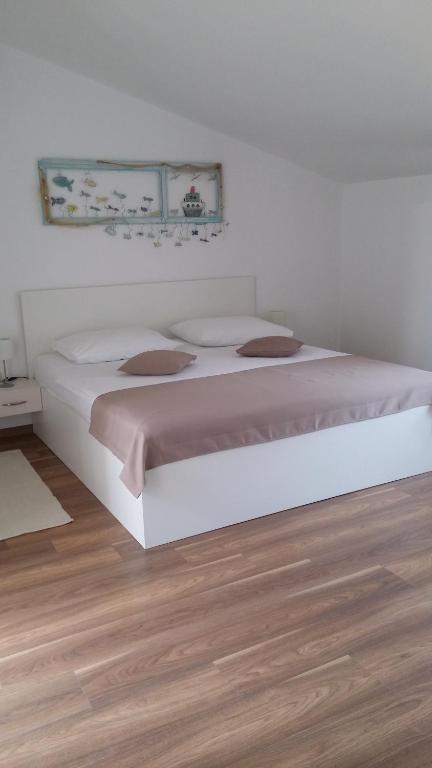 Postel nebo postele na pokoji v ubytování Rooms Vukušić