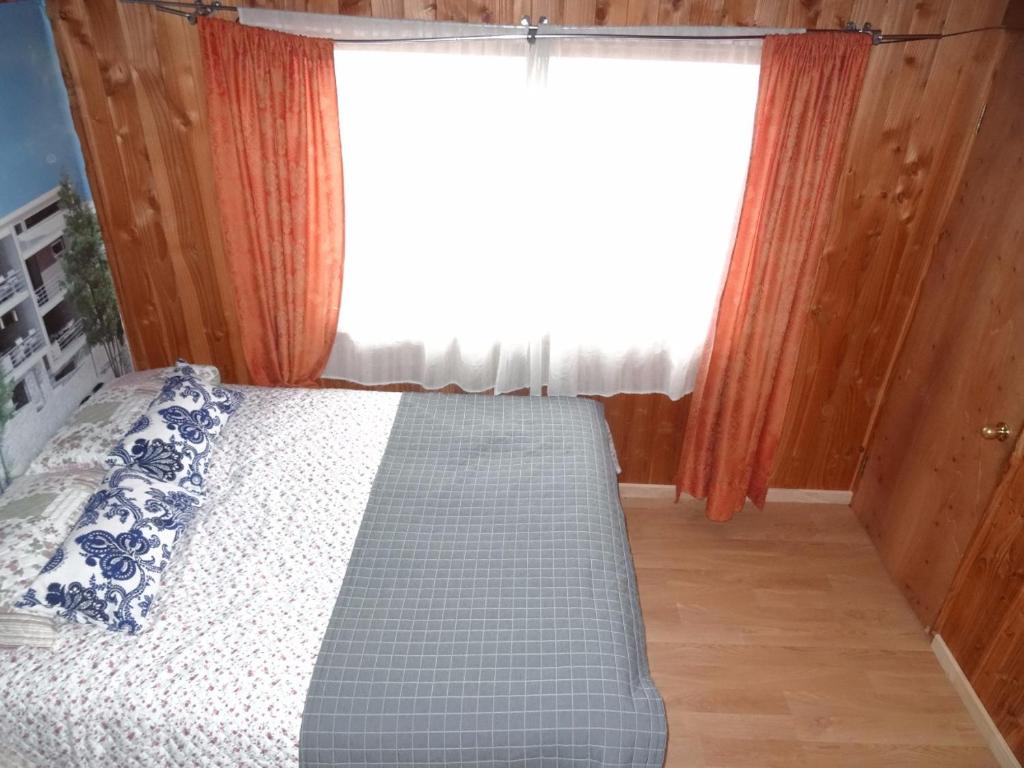 Postel nebo postele na pokoji v ubytování Hostal Maitahue