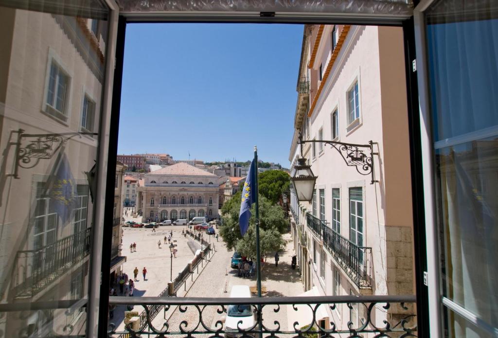 a view of a city from a balcony at Residencial Geres in Lisbon