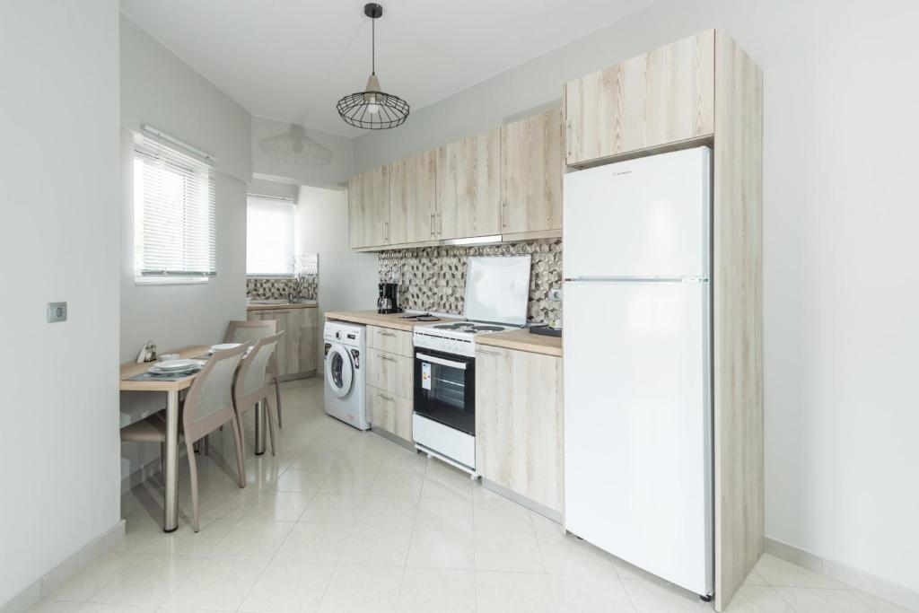Kuchyňa alebo kuchynka v ubytovaní Maritina Apartments