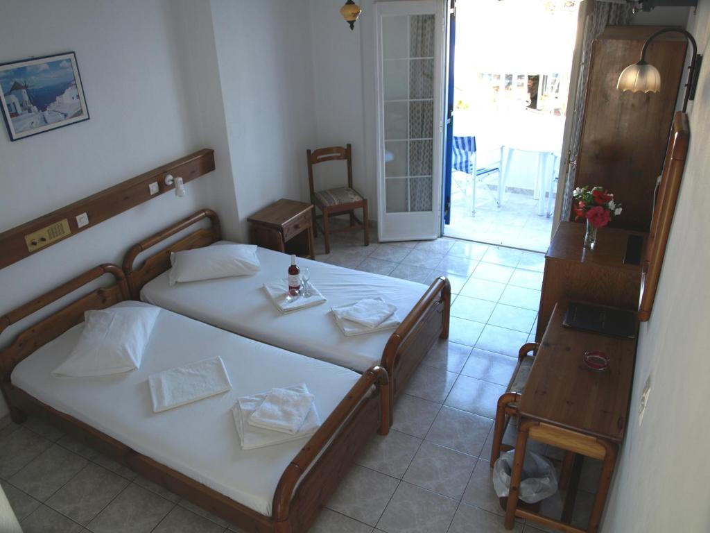 Postel nebo postele na pokoji v ubytování Levante Beach Hotel