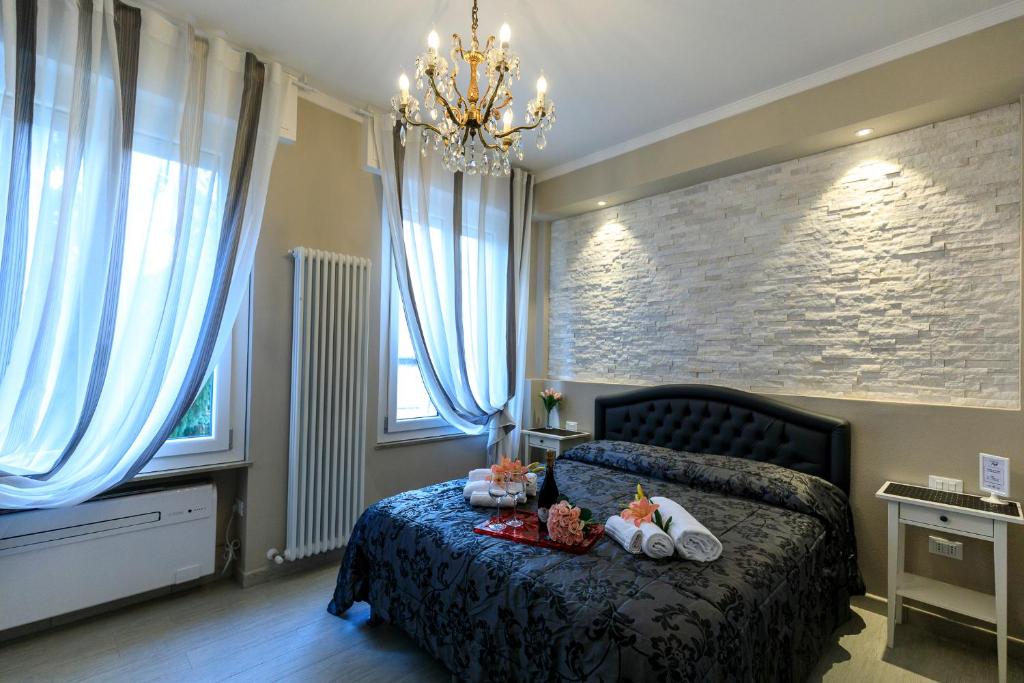 Кровать или кровати в номере Maison degli Artisti