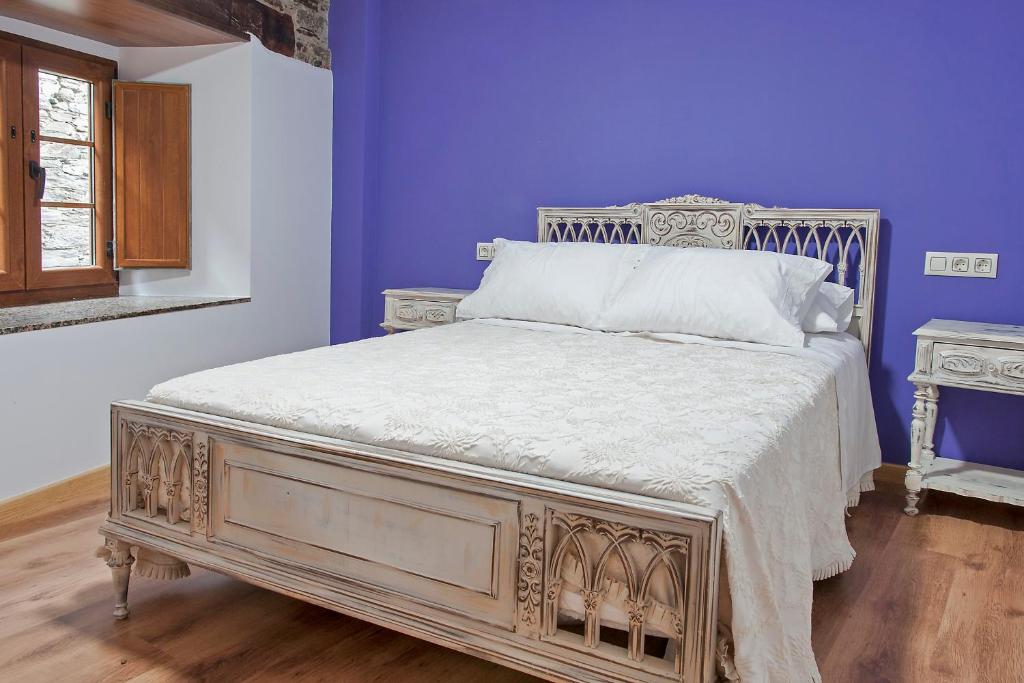 Postel nebo postele na pokoji v ubytování Apartamentos Casa Ramoncín