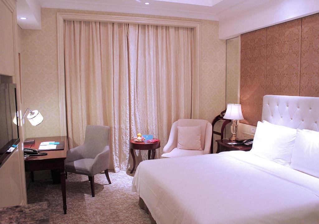 Postel nebo postele na pokoji v ubytování Carp Islet Resort Fuzhou