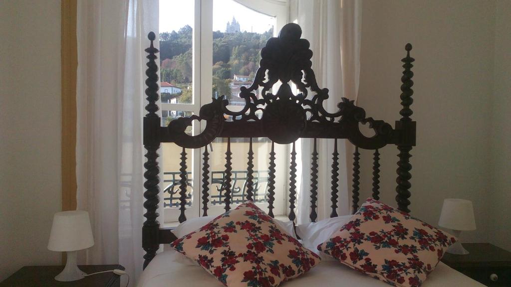 Postel nebo postele na pokoji v ubytování A Vianesa - Guest House