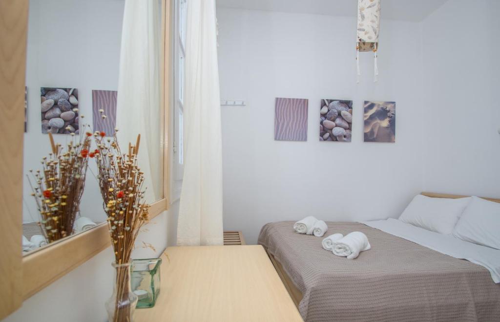 Letto o letti in una camera di Glarontas
