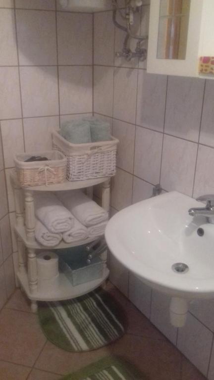 Koupelna v ubytování Dűlő Apartmanház