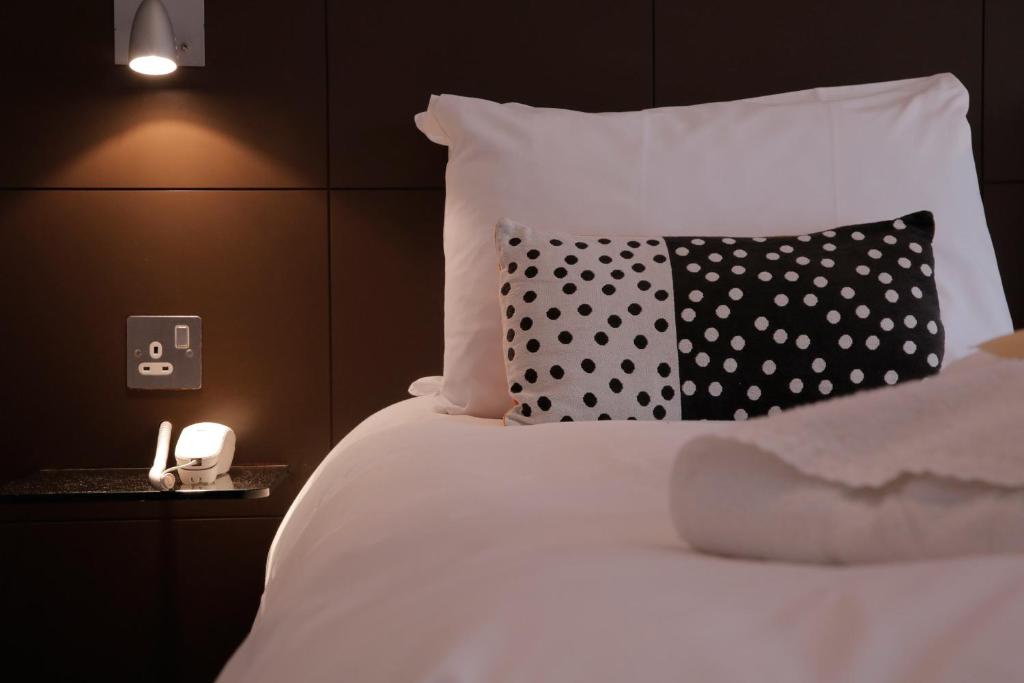Postel nebo postele na pokoji v ubytování B&B Belgravia