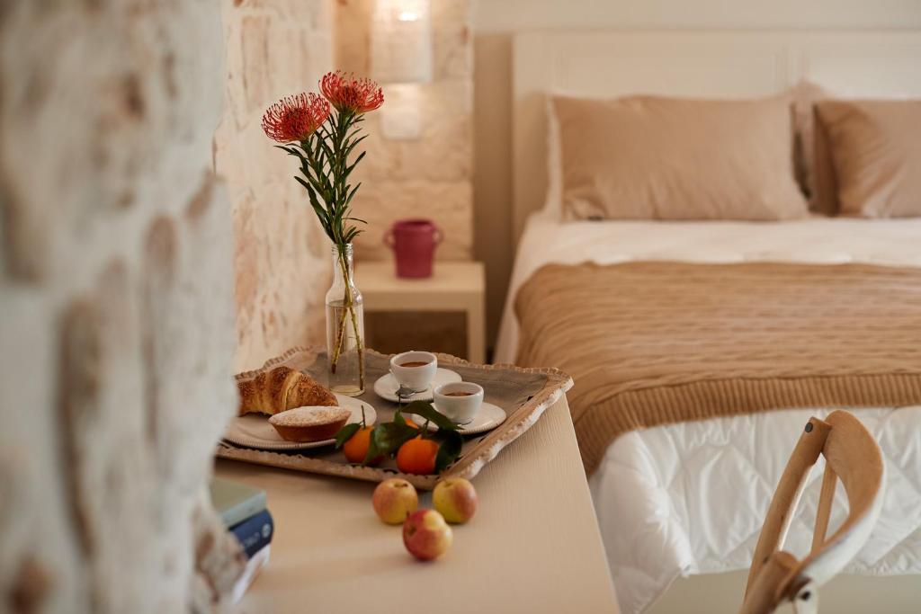 Postel nebo postele na pokoji v ubytování Masseria Grieco