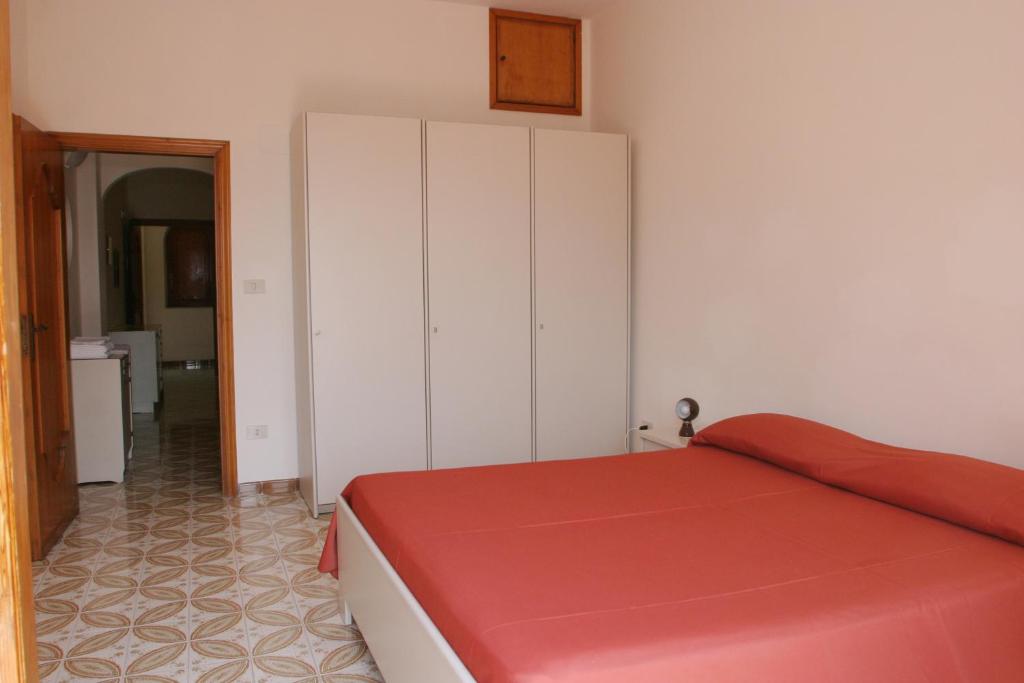 A bed or beds in a room at Residence Le Villette