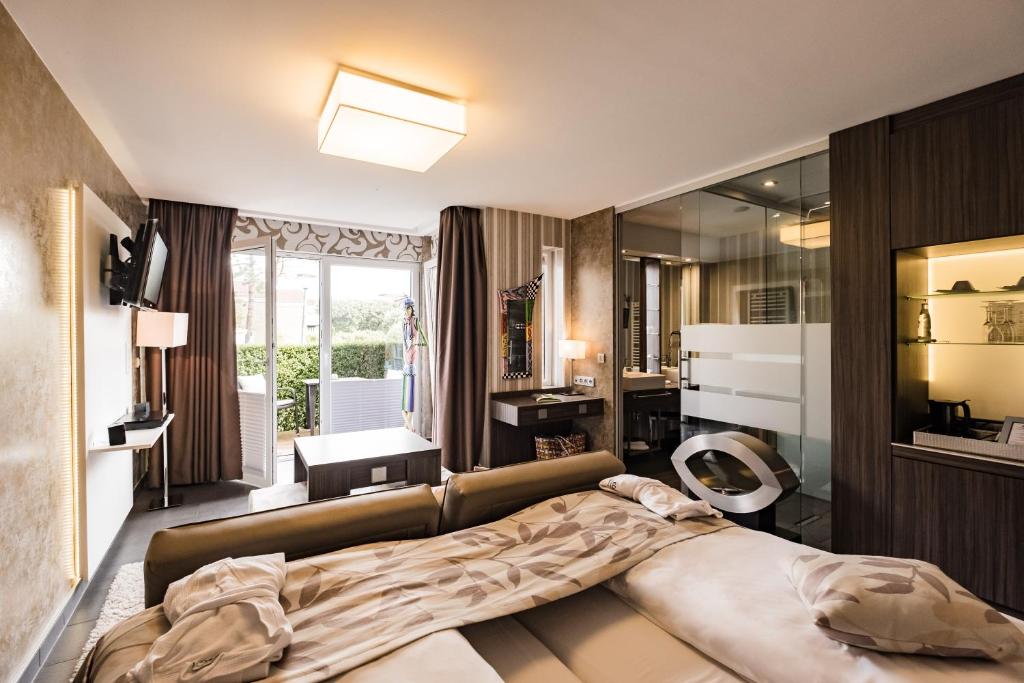 Postel nebo postele na pokoji v ubytování Hotel Kolb