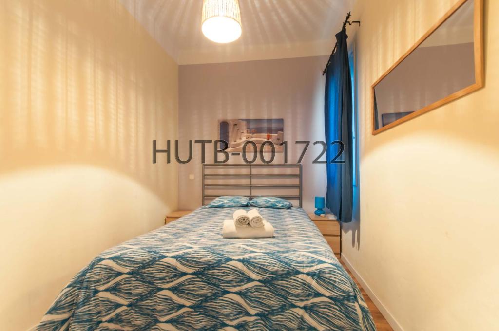Postel nebo postele na pokoji v ubytování Go-BCN Residence Sagrada Familia