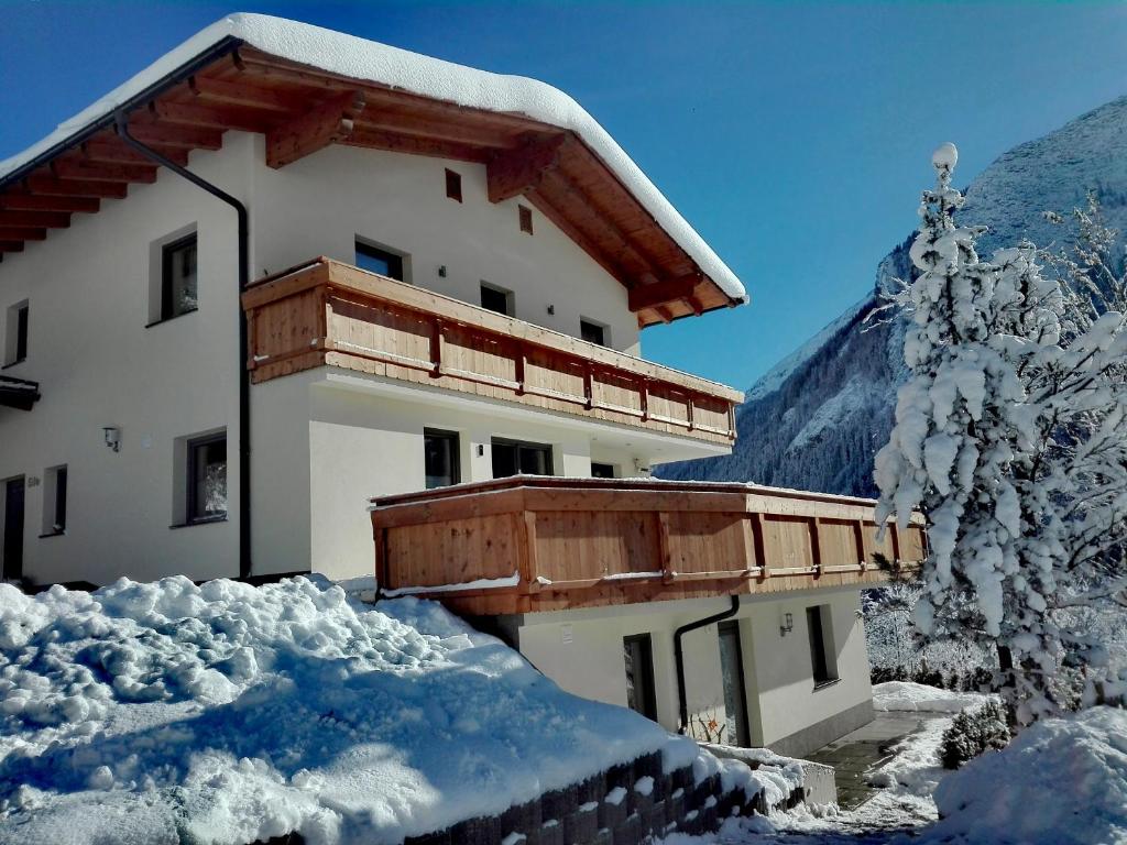 Nespecifikovaný výhled na hory nebo výhled na hory při pohledu z apartmánu