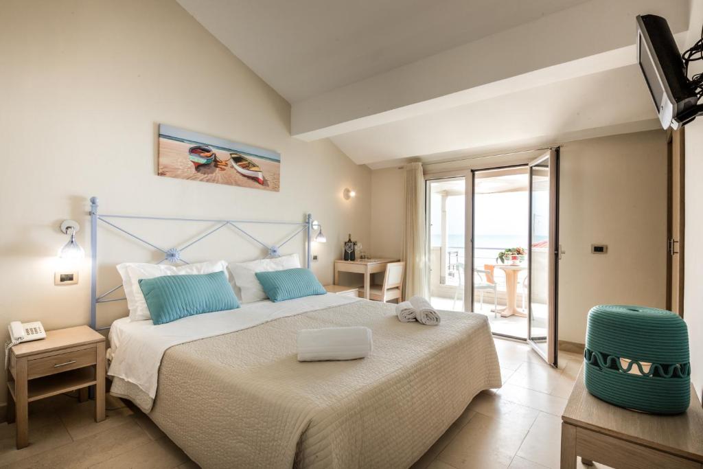 Voodi või voodid majutusasutuse Hotel Mar & Sol toas