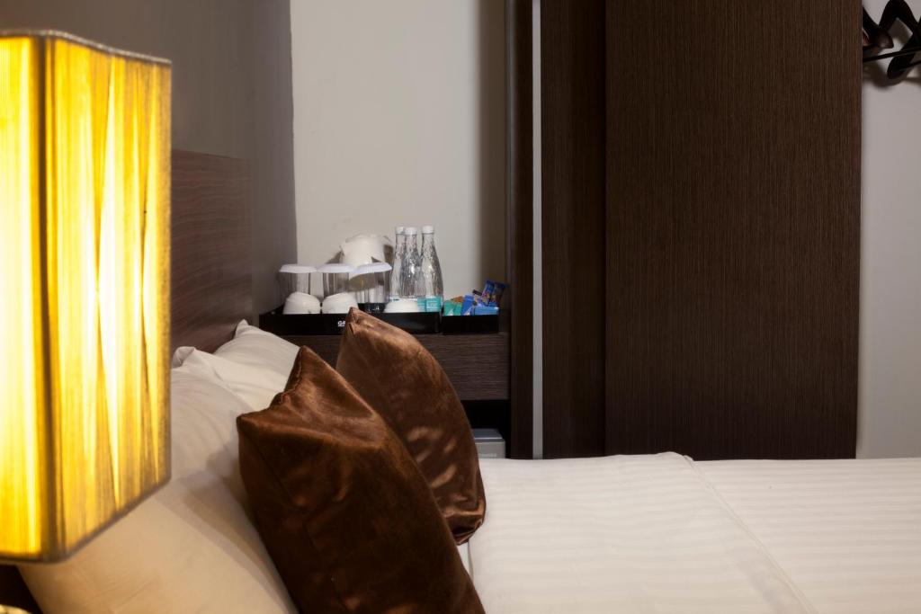 Letto o letti in una camera di Regantris Malioboro