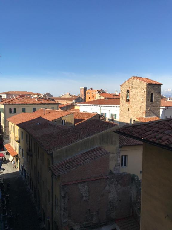 Nespecifikovaný výhled na destinaci Pisa nebo výhled na město při pohledu z penzionu