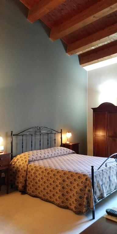Postel nebo postele na pokoji v ubytování Sorella Luna