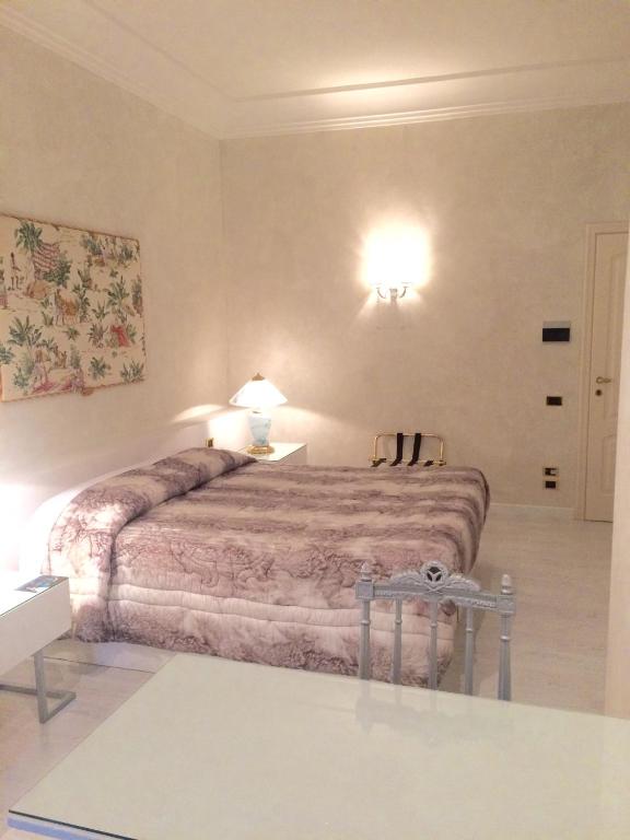 Postel nebo postele na pokoji v ubytování Hotel Parco dei Principi