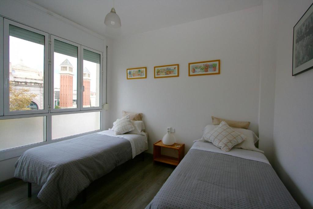 Posteľ alebo postele v izbe v ubytovaní ApartEasy - Plaza España Deluxe