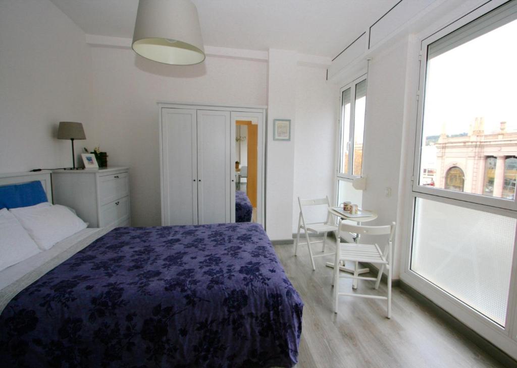 Posteľ alebo postele v izbe v ubytovaní ApartEasy - Plaza España Deluxe